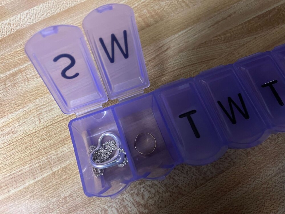 A pill organizer keeps your jewelry untangled and organized on the go